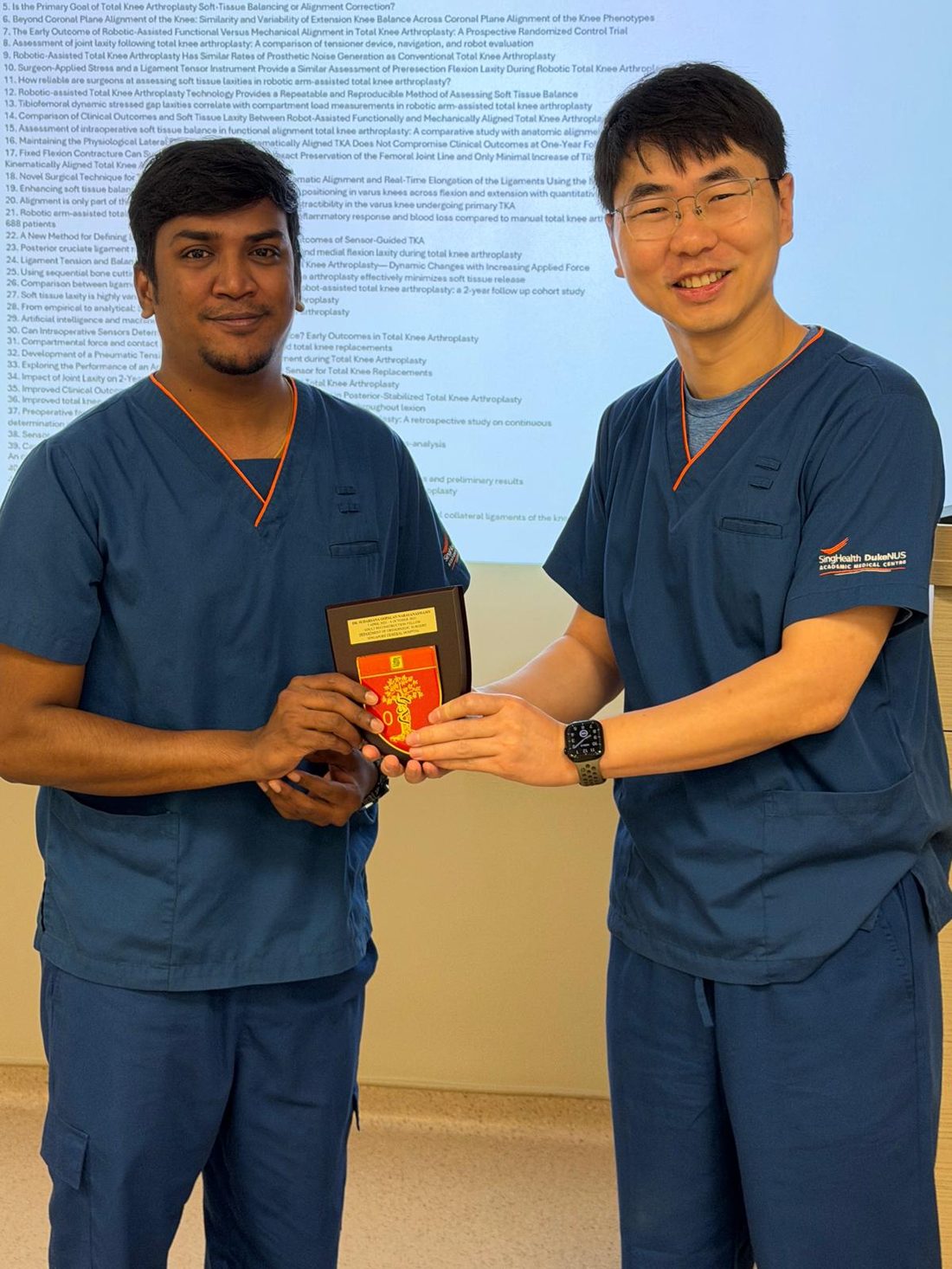 Dr. Sudarsana Gopalan receiving his Adult Reconstruction Fellowship award at Singapore General Hospital