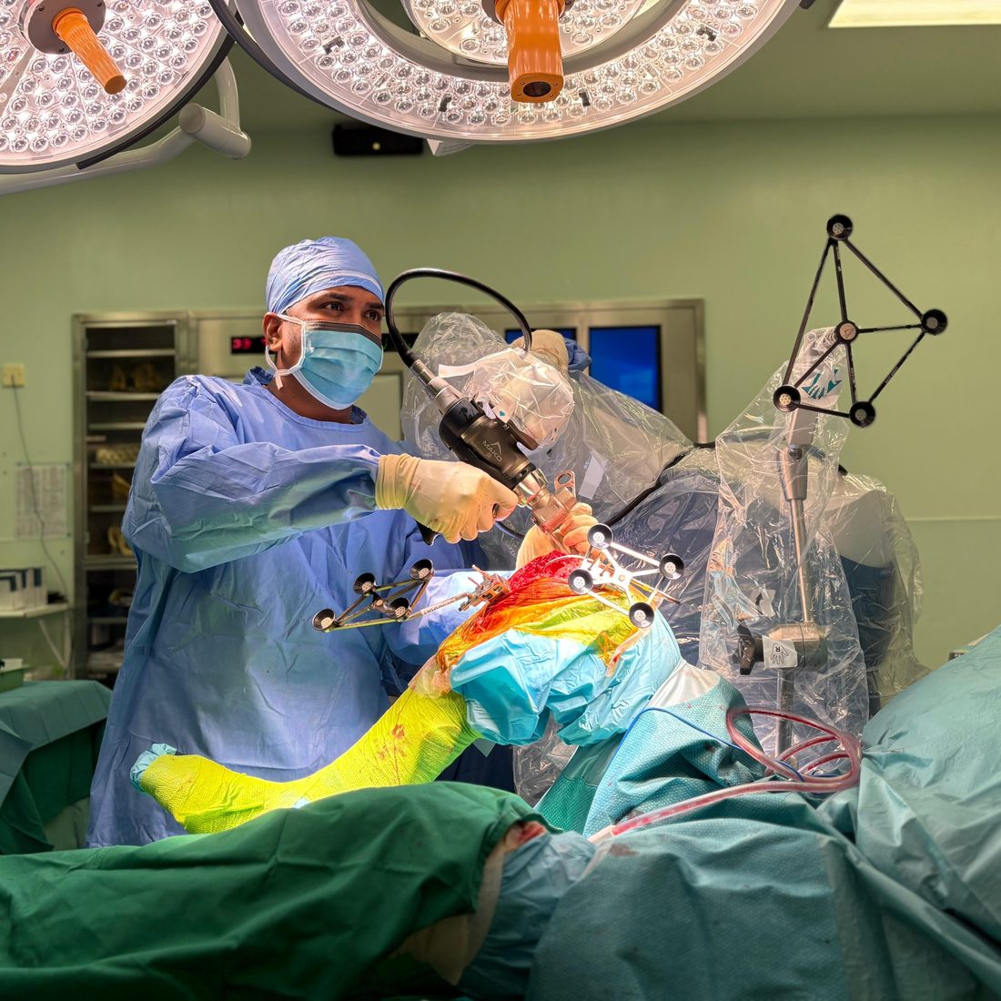 Dr. Sudarsana Gopalan performing robotic-assisted knee replacement surgery with the MAKO system